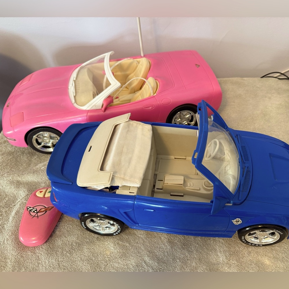 2 vintage Barbie cars. Both convertibles.